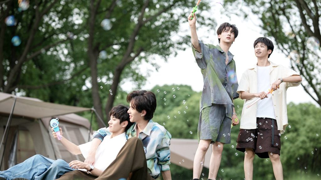 Wu Suo Wei, Chi Cheng, Jiang Xiao Shuai, and Guo Cheng Yu outside camping